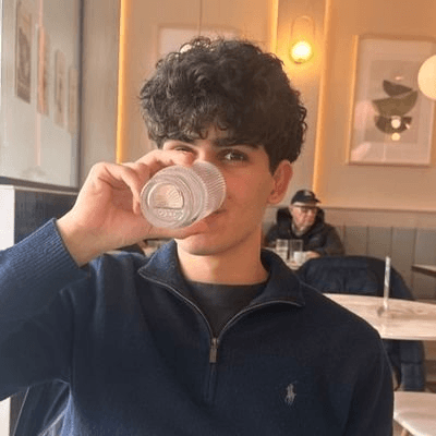 Remy at a cafe